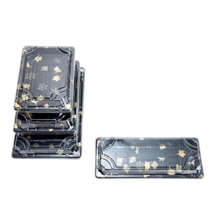 Black sushi takeaway trays with gold pattern.jpg