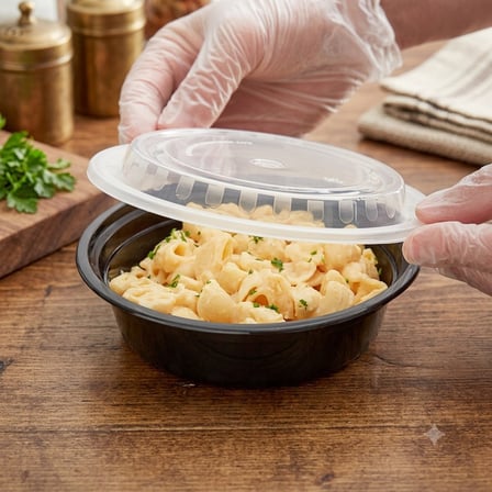 16 Ounce Black Round Microwavable Container With Food and Lid.jpg