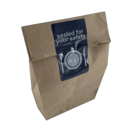 Brown paper lunch bag with dark blue tamper-evident food label