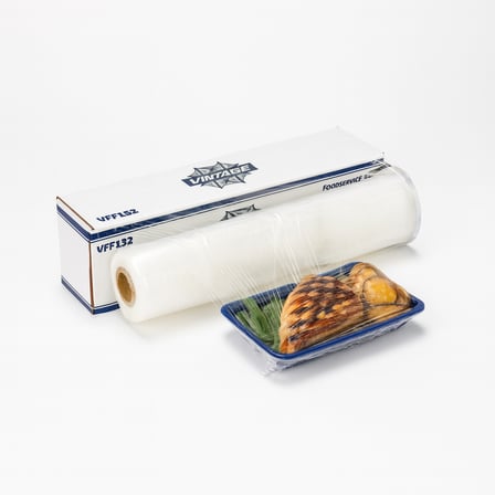 18 x 2000 clear food wrap covering a food tray.png