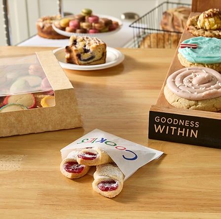 Cookies and pastries in a 4.8″ × 4″ paper cookie bag.jpg