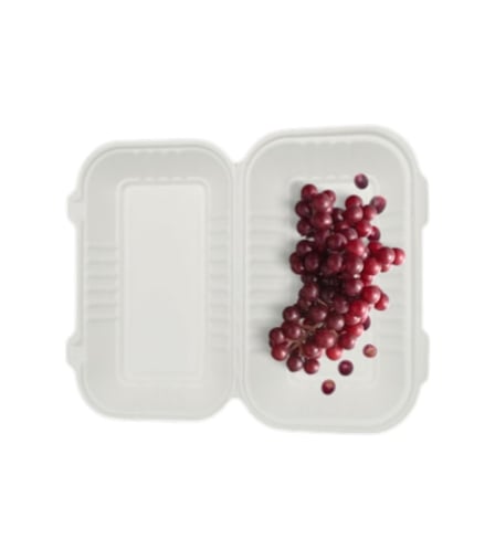 Top view of fresh red grapes in a 9 x 6 compostable bagasse clamshell take out container.jpg