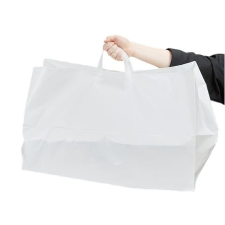 Hand carrying 14 x 12 x 12 white HDPE plastic Take-out bag.jpg