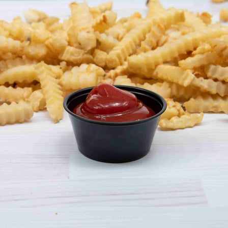 Solo Black PS Plastic Portion Cup with sauce & fries, 2 ounces.jpg