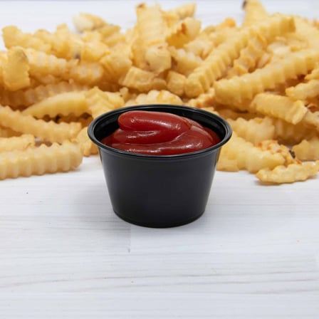Solo Black PS Plastic Portion Cup with sauce & fries, 4 ounces.jpg