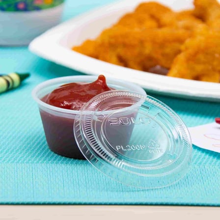 Solo 1.5 to 2.5 Ounce Clear PET Plastic Souffle Cup Lid with Cup.jpg