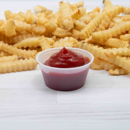 Solo Translucent PS Plastic Portion Cup with sauce & fries, 3.25 ounces.jpg